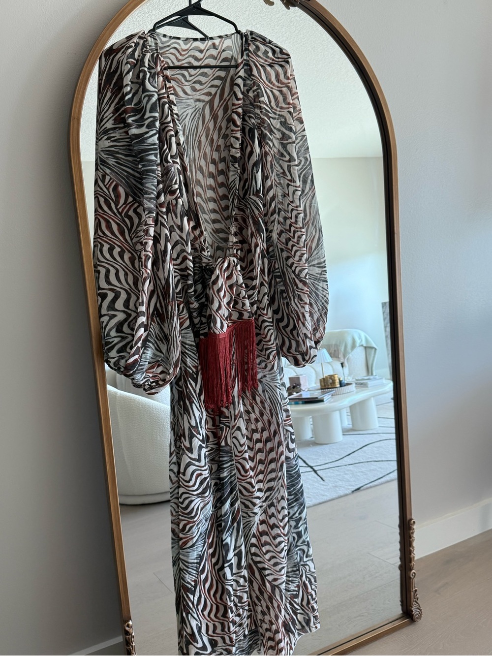 Flowing Zebra-Print Maxi Dress with Red Tassel Tie